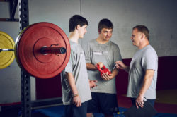 Athlete Pro wrestling strength conditioning coaching weights